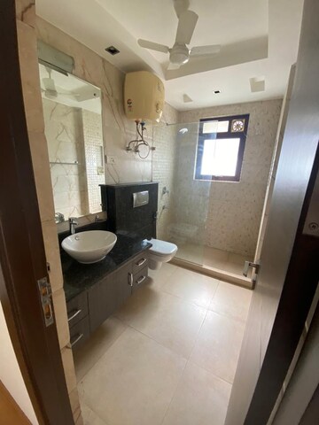 Bathroom in 4 BHK Apartment at East Of Kailash – for Sale