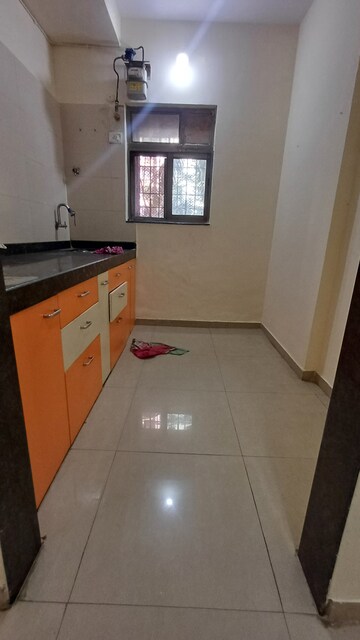 Kitchen in 2 BHK Apartment at Dosti Vihar, Samata Nagar – for Rent