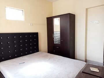 Bedroom in 1 BHK Apartment at Pongam Apartment 61, Vasant Vihar – for Rent