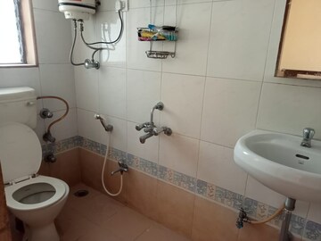Bathroom in 1 BHK Apartment at Pongam Apartment 61, Vasant Vihar – for Rent
