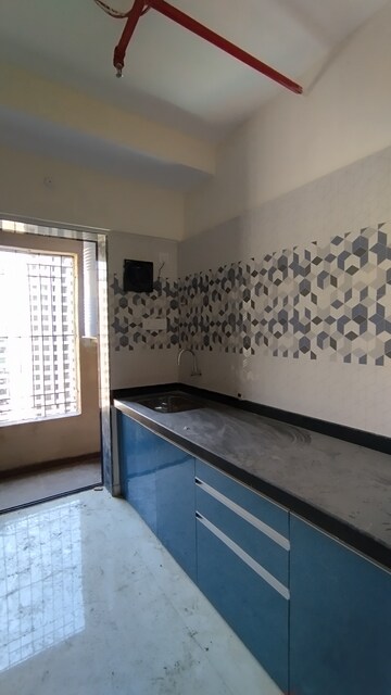 Kitchen in 1 BHK Apartment at Raunak City Sector 4, Kalyan West – for Rent