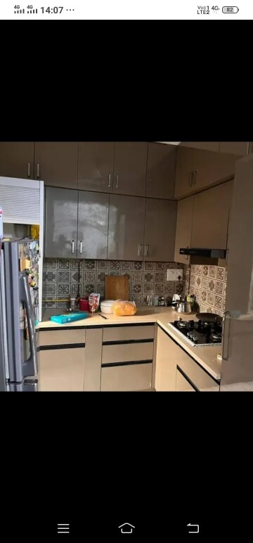 Kitchen in 2 BHK Apartment at Mahagun Mywoods, Sector 16c Greater Noida – for Rent