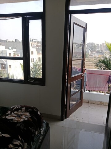 Room in 2 BHK Apartment at Dhakoli Village – for Rent