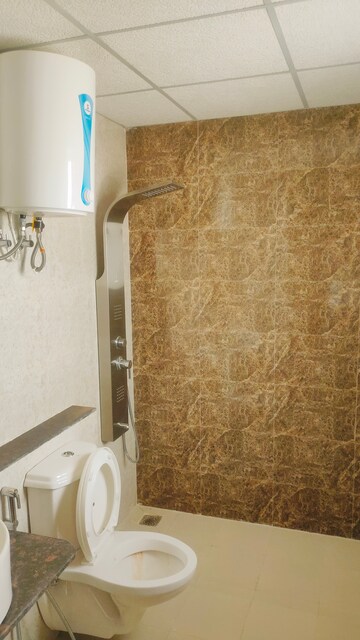 Bathroom in 3 BHK Apartment at Sushma Elite Cross, Dhakoli Village – for Rent