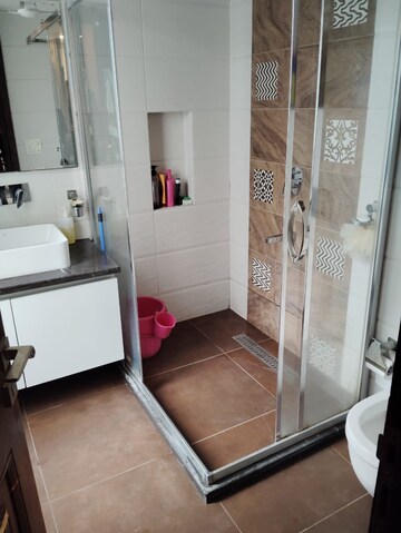 Bathroom in 4 BHK Builder Floor at DLF Queens Court, Greater Kailash ii – for Rent