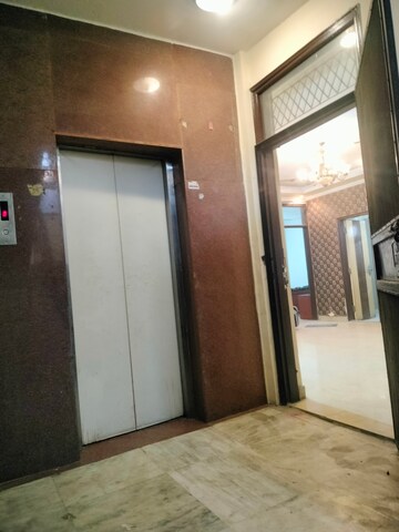 Building Lobby in 2 BHK Apartment at Freedom Fighters Enclave – for Rent