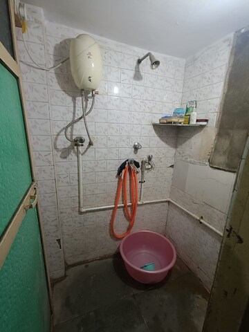 Bathroom in 2 BHK Apartment at Cosmos Solitaire, Virar West – for Sale
