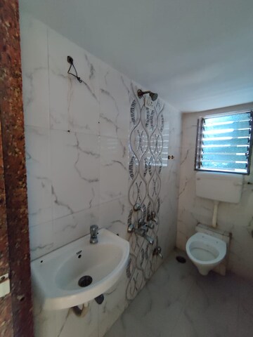 Bathroom in 2 BHK Apartment at Amrut Aangan, Kalwa – for Sale