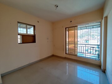 Room in 2 BHK Apartment at Amrut Aangan, Kalwa – for Sale