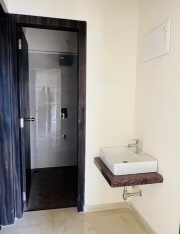 Bathroom in 1 BHK Apartment at Shree Tirupati STG Signature Residency, Ghodbunder Road – for Rent