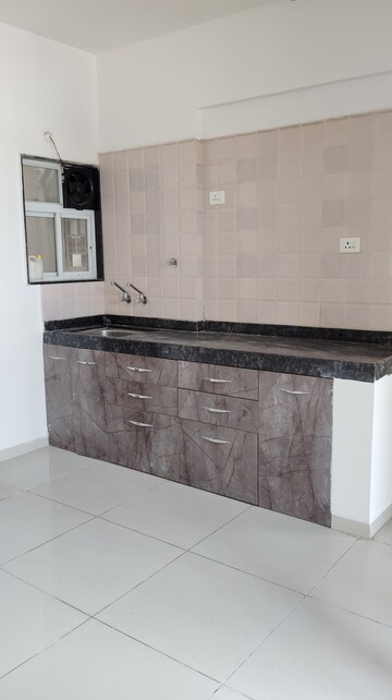 Kitchen in 1 BHK Apartment at Mittal Arc Vista, Dhanori – for Rent