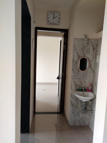 Building Lobby in 2 BHK Apartment at Mohan Willows, Badlapur East – for Rent