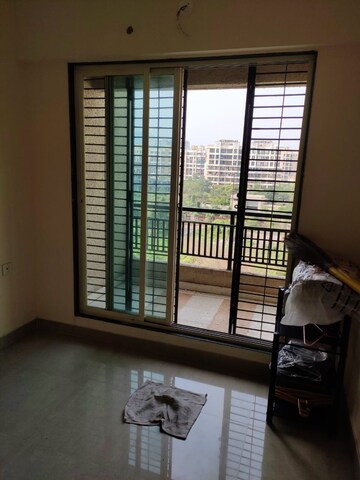 Room in 2 BHK Apartment at Mohan Willows, Badlapur East – for Rent