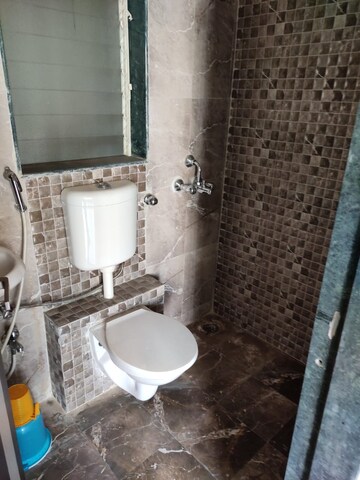 Bathroom in 2 BHK Apartment at Mohan Willows, Badlapur East – for Rent