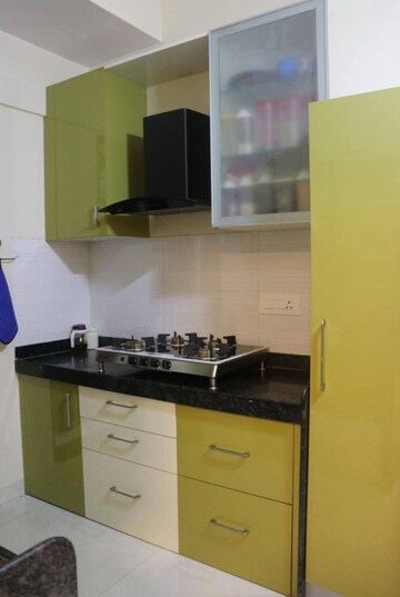 Kitchen in 2 BHK Apartment at Rustomjee Urbania Azziano, Majiwada – for Rent