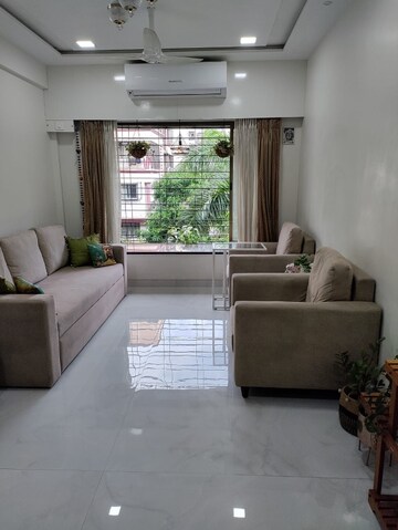 Living Room in 2 BHK Apartment at Sagar Sanjog CHS, Andheri West – for Rent