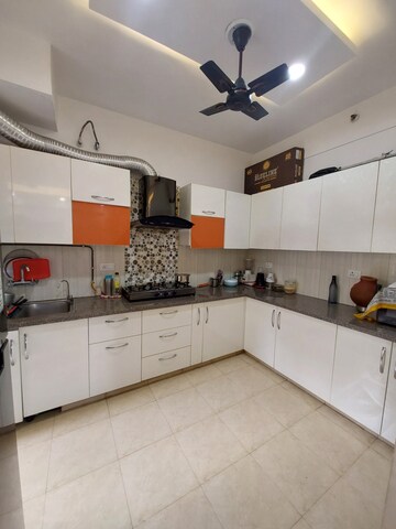 Kitchen in 4 BHK Apartment at Purvanchal Heights, Zeta I Greater Noida – for Sale