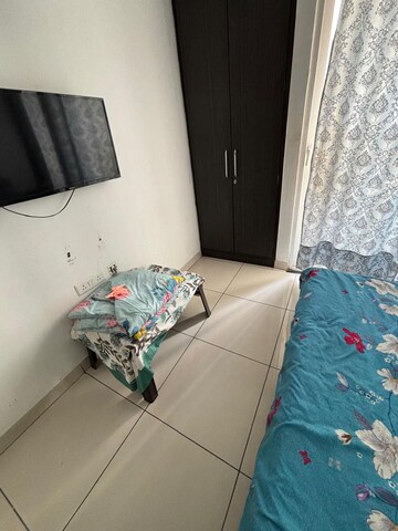 Master Bedroom in 1 BHK Apartment at Paradigm Business Hermitage Park, Dhakoli Village – for Rent