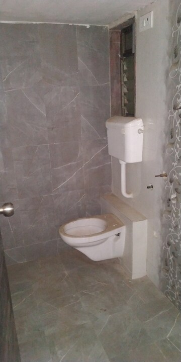 Bathroom in 2 BHK Apartment at Raj Viva Maitry Heights, Virar West – for Sale