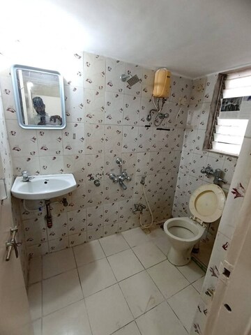 Bathroom in 1 BHK Apartment at JSB Nakshatra Greens, Naigaon East – for Rent