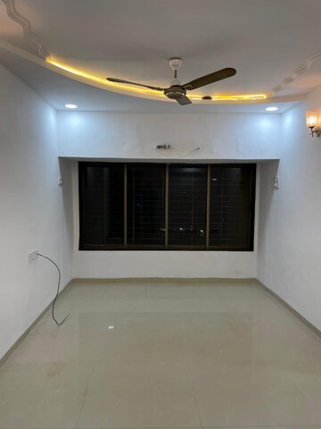 Room in 2 BHK Apartment at Mangal Orchid Chs, Andheri West – for Sale