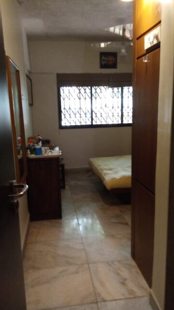 Room in 1 BHK Apartment at Chanchal Kalyan Complex, Yari Road – for Sale