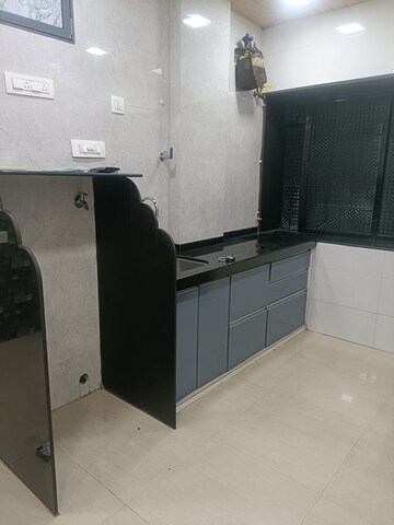 Kitchen in 1 BHK Apartment at Achal Avichal Chanchal CHS, Andheri West – for Sale