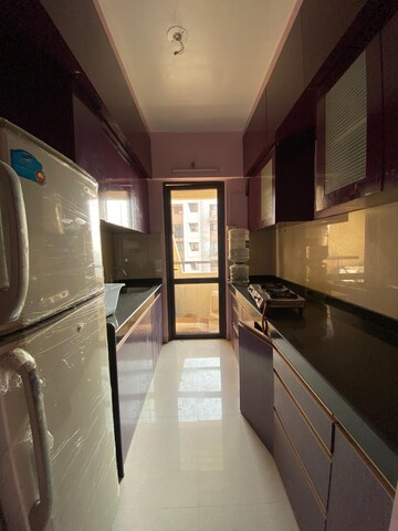Kitchen in 1 BHK Apartment at Lodha Palava City Lakeshore Greens, Dombivli East – for Rent