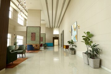 Living Room in 1 RK Apartment at Paramount Golf Forest Studio Apartments - OAK Towe, Zeta I Greater Noida – for Sale