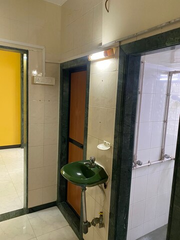 Bathroom in 1 BHK Apartment at Manish Tower, Andheri West – for Rent