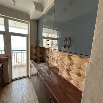 Kitchen in 2.5 BHK Apartment at Amrapali Riverview, Amrapali Leisure Valley – for Rent