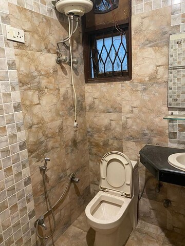 Bathroom in 4 BHK Builder Floor at Ansal Sushant Lok I, Sector 43 – for Rent