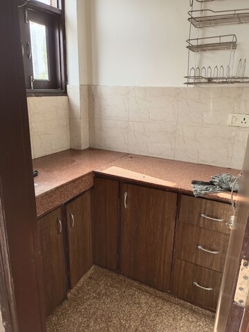 Kitchen in 1 RK Builder Floor at Ansal Sushant Lok I, Sector 43 – for Rent