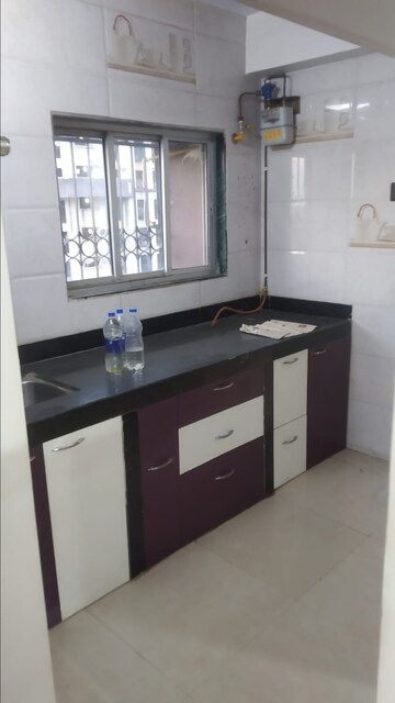 Kitchen in 1 BHK Apartment at New Mhada Tower, Malad West – for Sale