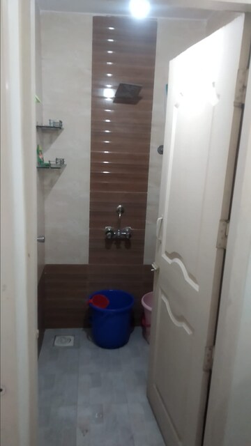 Bathroom in 1 BHK Apartment at New Mhada Tower, Malad West – for Sale
