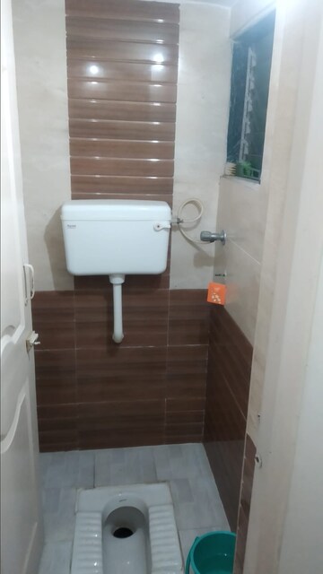 Bathroom in 1 BHK Apartment at New Mhada Tower, Malad West – for Sale