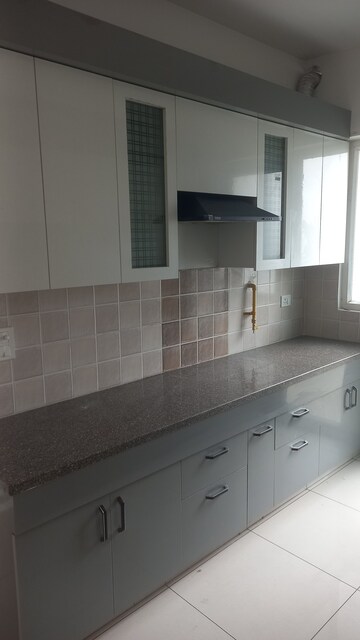 Kitchen in 3 BHK Apartment at Nirala Estate II, Tech Zone 4 Greater Noida – for Rent
