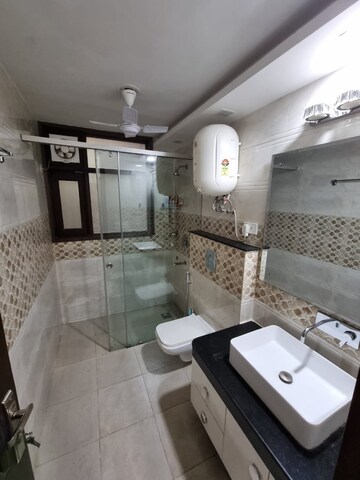 Bathroom in 3 BHK Builder Floor at Ansal Sushant Lok I, Sector 43 – for Rent