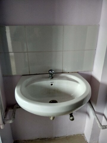 Bathroom in 1 BHK Apartment at New Mhada Tower, Malad West – for Sale