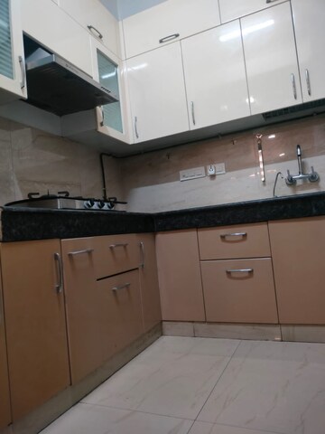 Kitchen in 2.5 BHK Apartment at Nimbus The Golden Palm, Sector 168 – for Rent