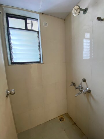 Bathroom in 1 BHK Apartment at Lodha Crown Taloja Quality Homes, Dombivli East – for Rent
