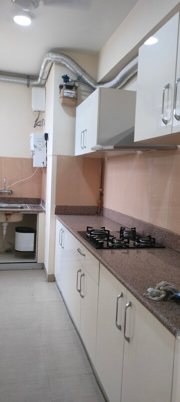 Kitchen in 3 BHK Apartment at Emaar Emerald Floors Premier, Sector 65 – for Rent
