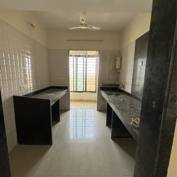 Kitchen in 2 BHK Apartment at Regency Sarvam, Titwala – for Rent