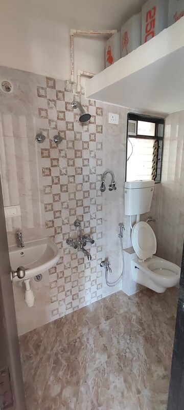 Bathroom in 1 BHK Apartment at Bhoomi Acropolis, Virar West – for Rent