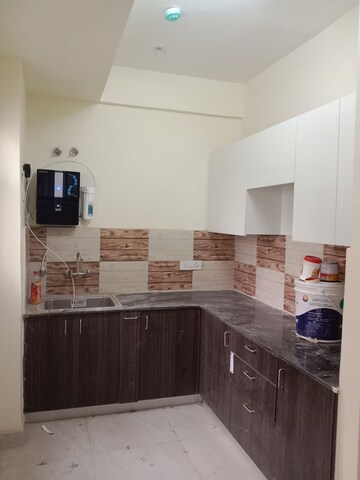 Kitchen in 2 BHK Apartment at Amrapali Dream Valley, Tech Zone 4 Greater Noida – for Rent