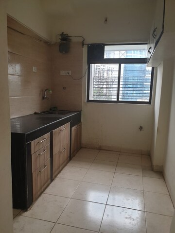 Kitchen in 2 BHK Apartment at Runwal Heights, Mulund West – for Sale