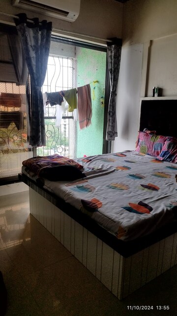 Bedroom in 1 BHK Apartment at Ravi CHS Kandivali, Kandivali West – for Sale