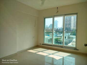 Room in 2 BHK Apartment at Triumph Tower, Malad West – for Rent