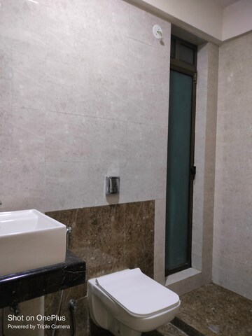 Bathroom in 2 BHK Apartment at Rajesh Raj Infinia, Malad West – for Rent