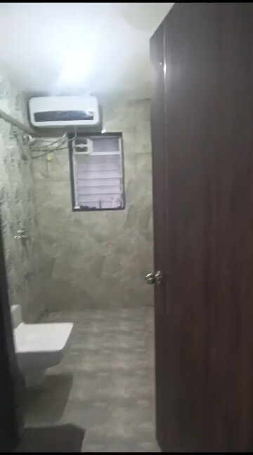Bathroom in 2.5 BHK Apartment at Shakun CHS, Vile Parle East – for Rent